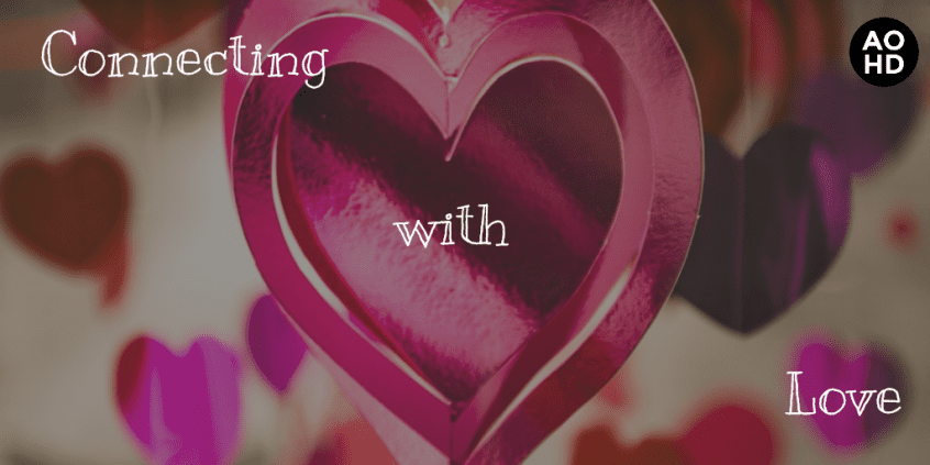 connecting with love white text on heart background